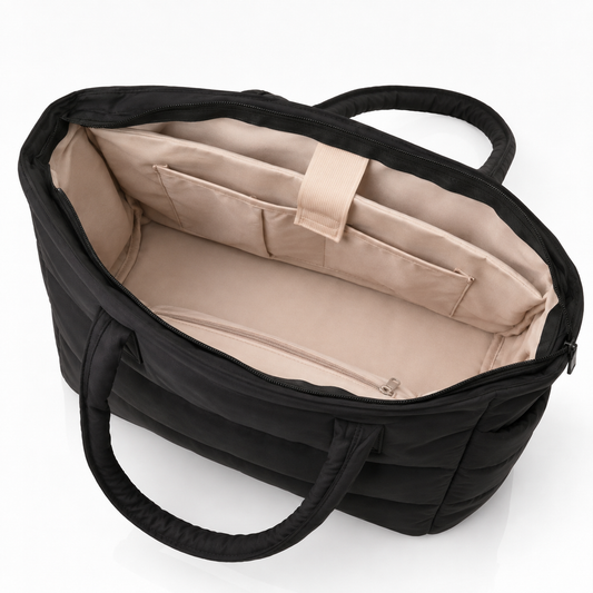 Black quilted laptop tote bag with water-resistant finish