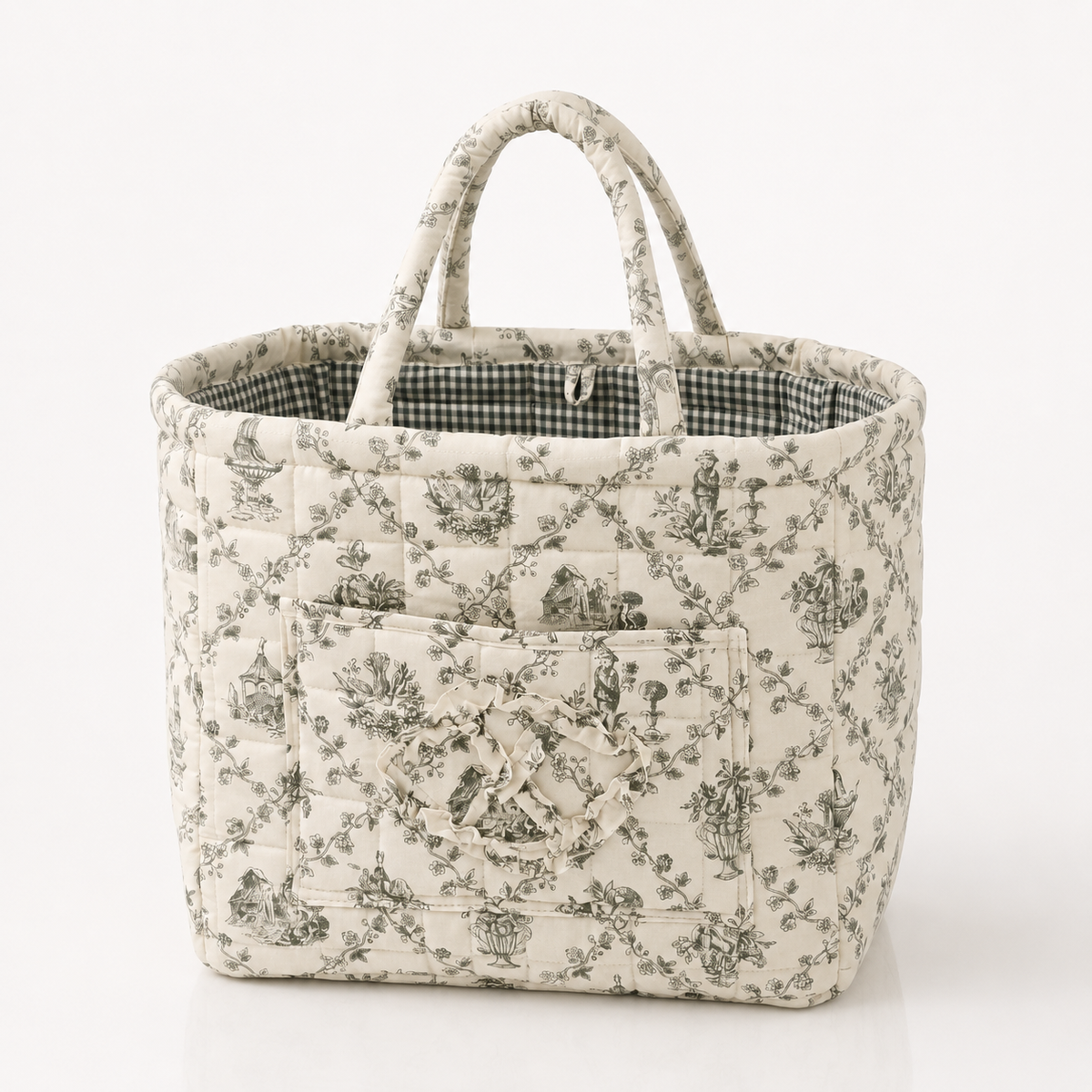Quilted cotton storage basket with handles and front pocket