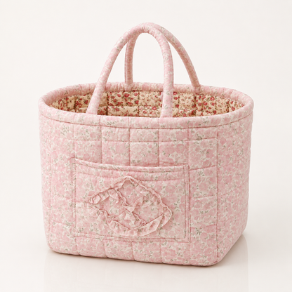 Quilted cotton storage basket with handles and front pocket
