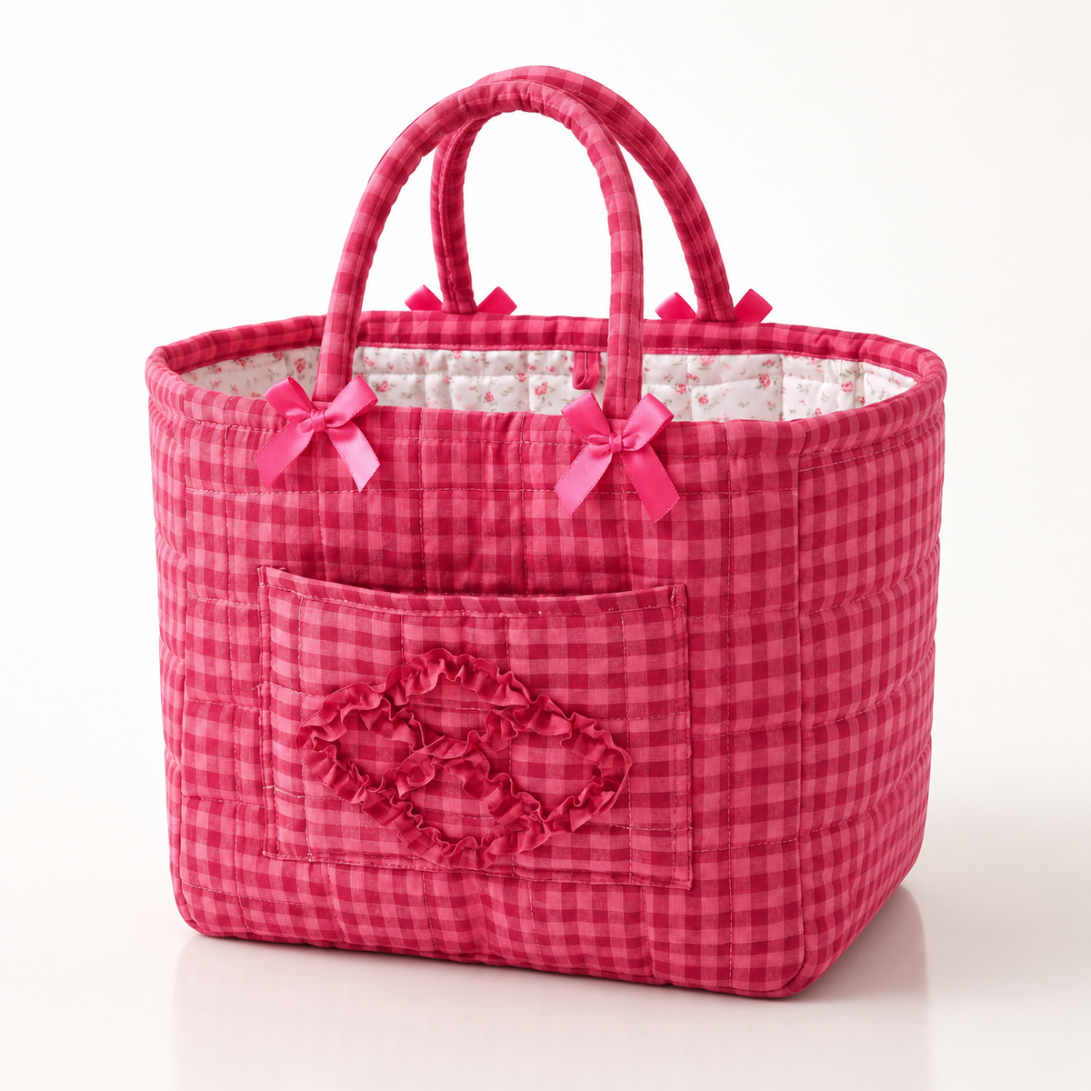 Quilted cotton storage basket with handles and front pocket