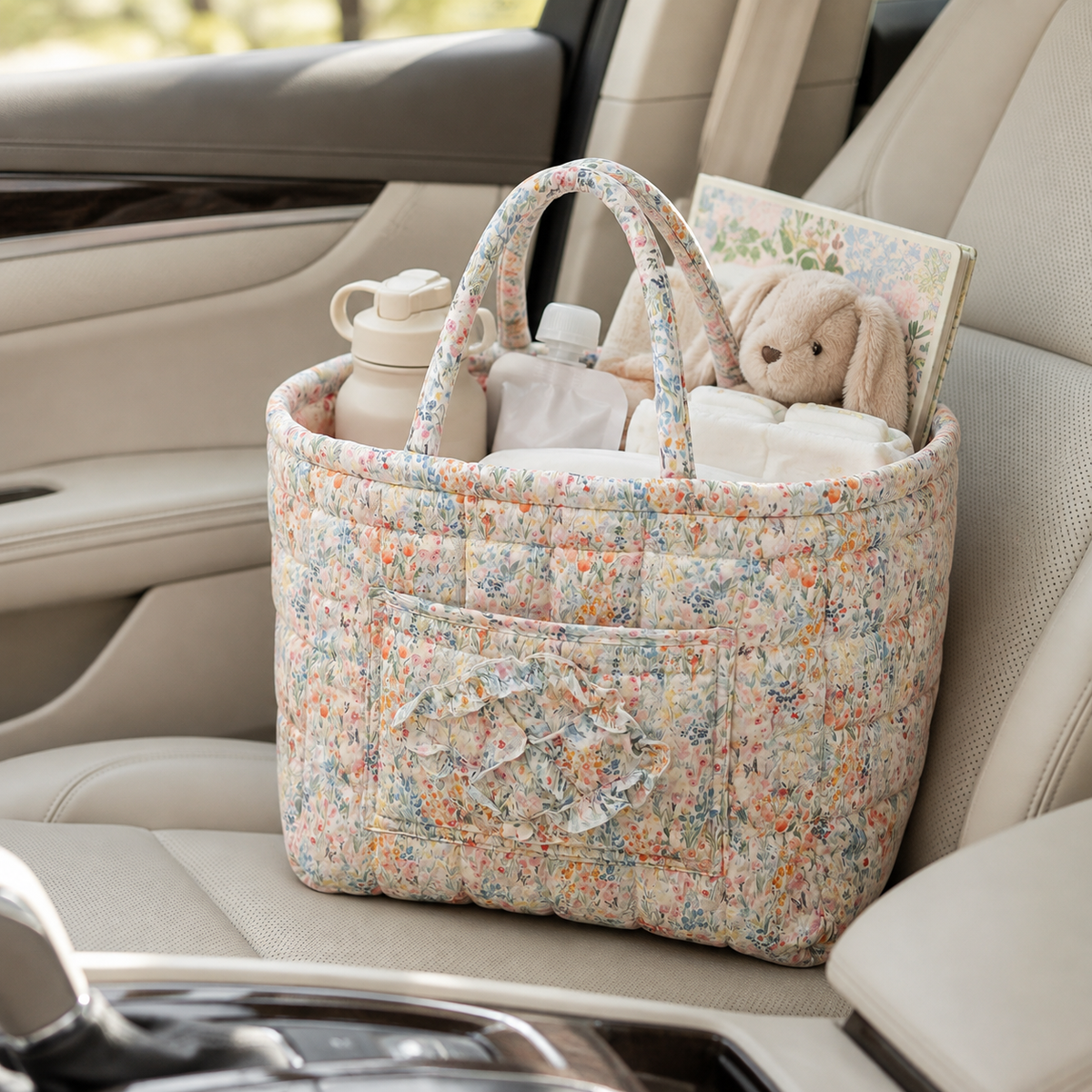 Quilted cotton storage basket with handles and front pocket