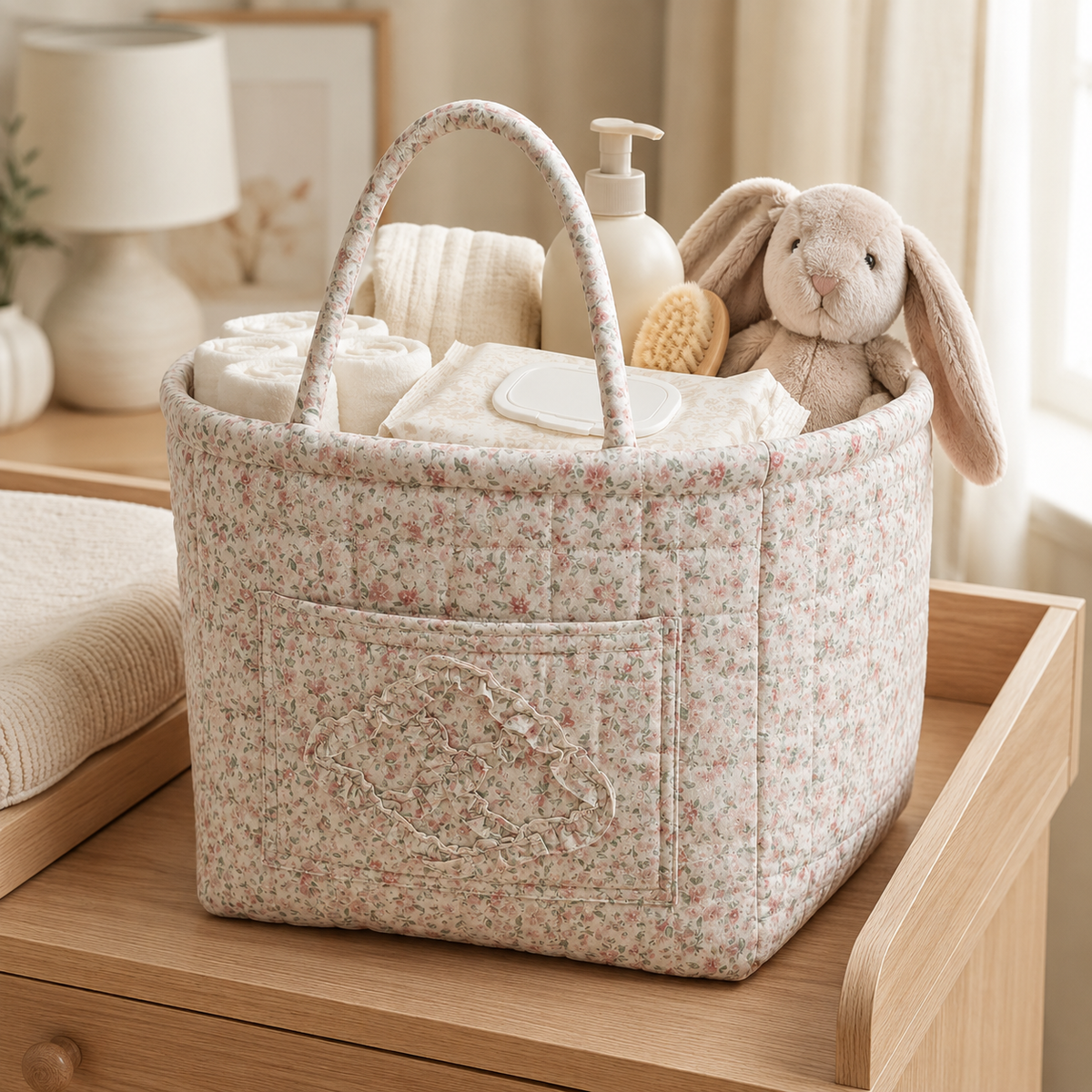 Quilted cotton storage basket with handles and front pocket