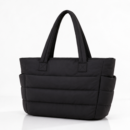 Black quilted laptop tote bag with water-resistant finish