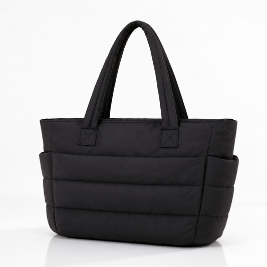 Black quilted laptop tote bag with water-resistant finish