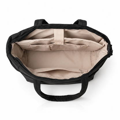 Black quilted laptop tote bag with water-resistant finish
