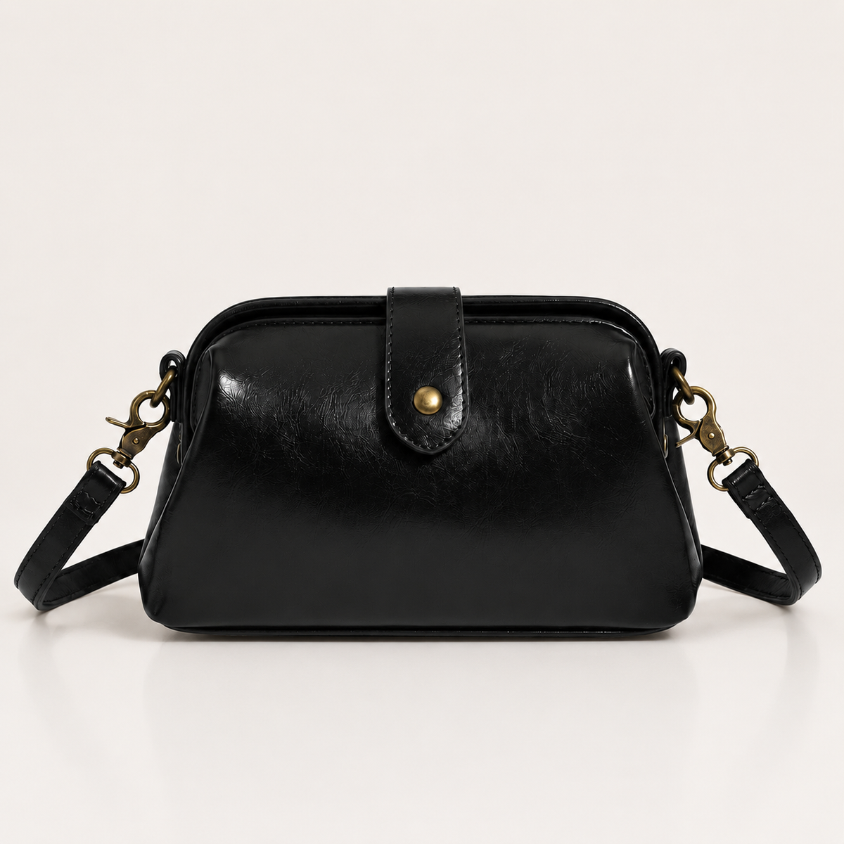 Vintage vegan leather crossbody bag with adjustable strap