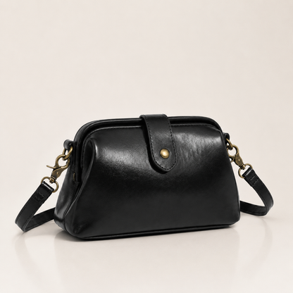 Vintage vegan leather crossbody bag with adjustable strap