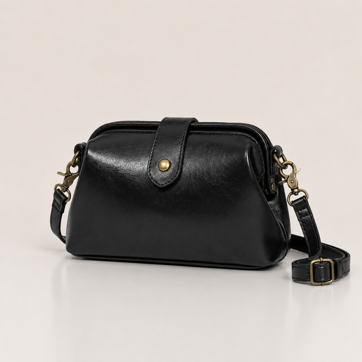 Vintage vegan leather crossbody bag with adjustable strap