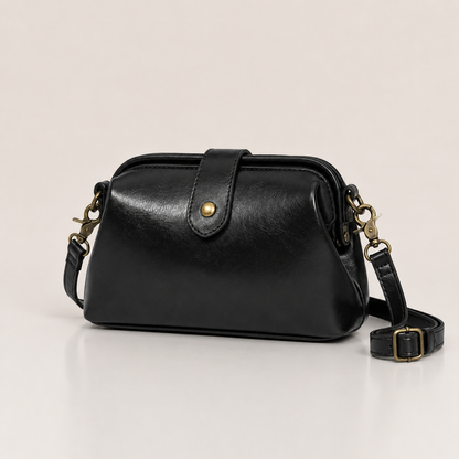 Vintage vegan leather crossbody bag with adjustable strap