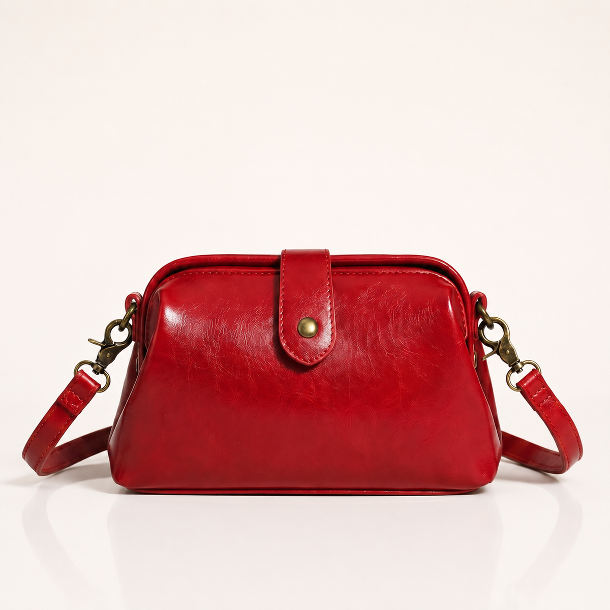 Vintage vegan leather crossbody bag with adjustable strap