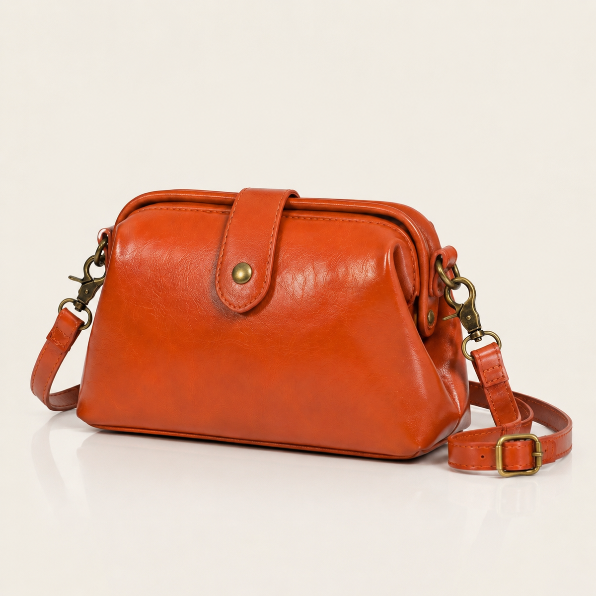 Vintage vegan leather crossbody bag with adjustable strap