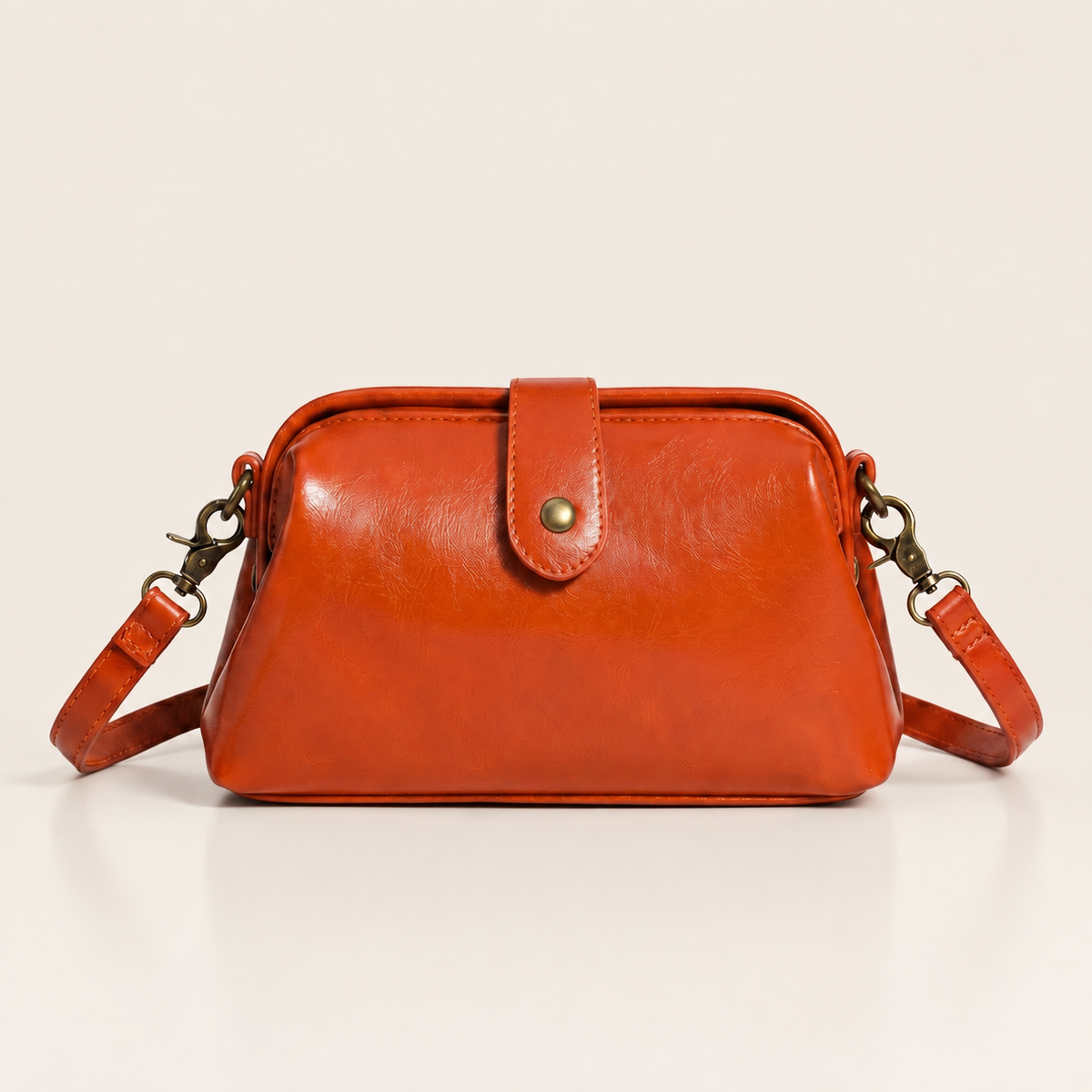 Vintage vegan leather crossbody bag with adjustable strap